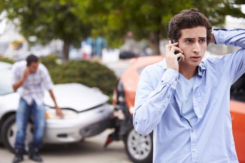 A man calling a Cheektowaga car accident lawyer after being rear-ended.