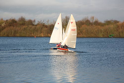 This image shows sailboats colliding.