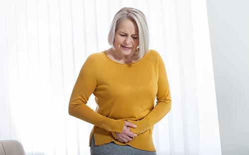 This image shows a woman with abdominal pain.