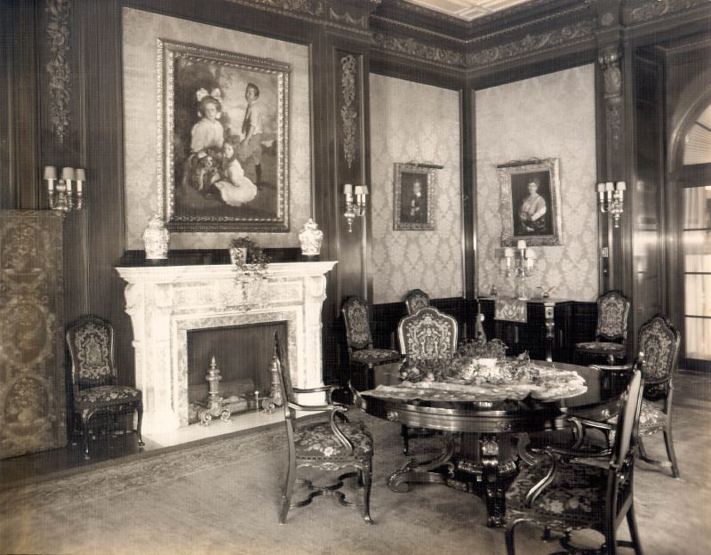 The Fireplace and Furniture In The Dining Room