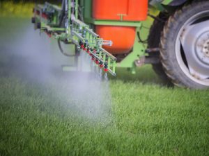 Spraying fields with Paraquat Weed Killer, a substance linked to Parkinson's disease
