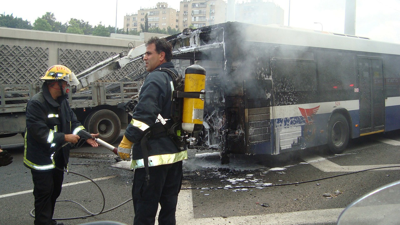 Firefighters helping at a scene of a bus crash in Brooklyn