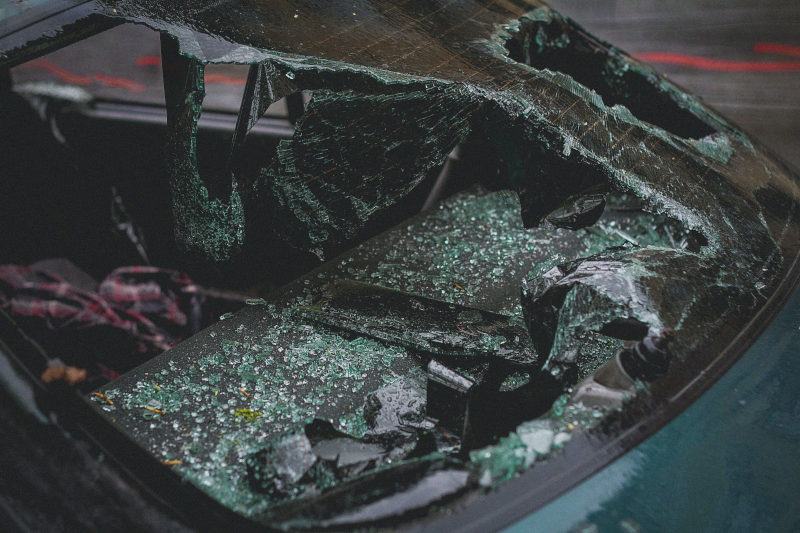 Tesla car with a broken shield after a car crash