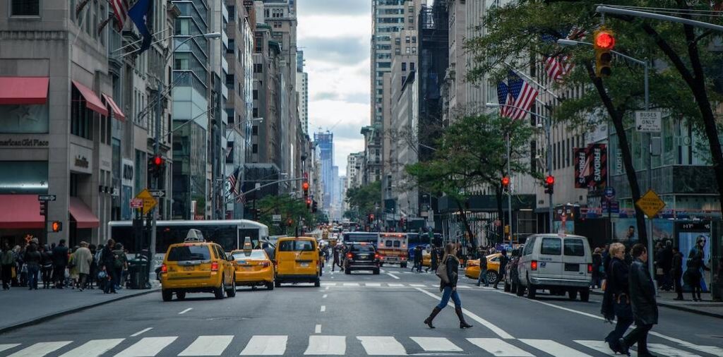 Pedestrians Crossing The Street In New York