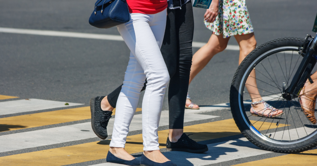 pedestrian crossing the street