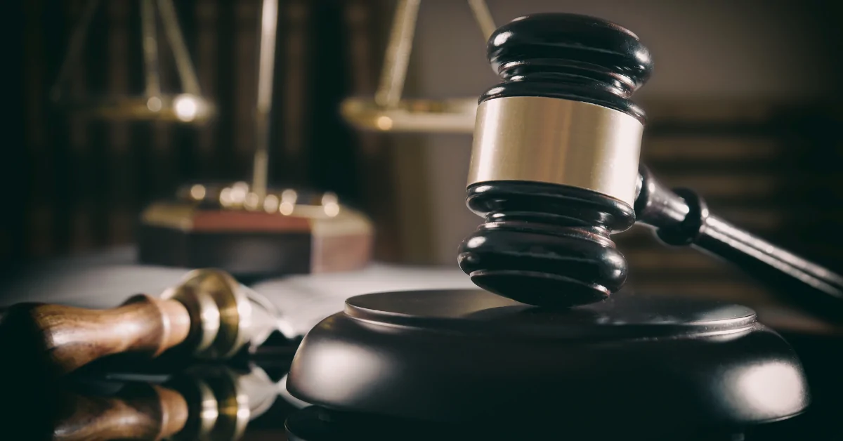 Gavel and scale of justice representing the timeline of a personal injury case.
