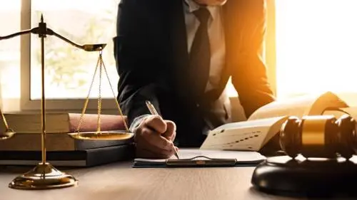 A Manhattan construction accident lawyer filing an injury claim for a client.