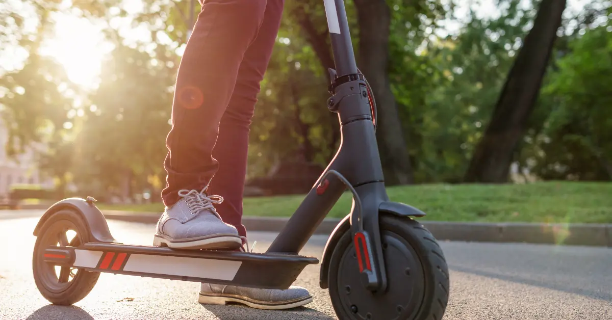 Man riding e-scooter