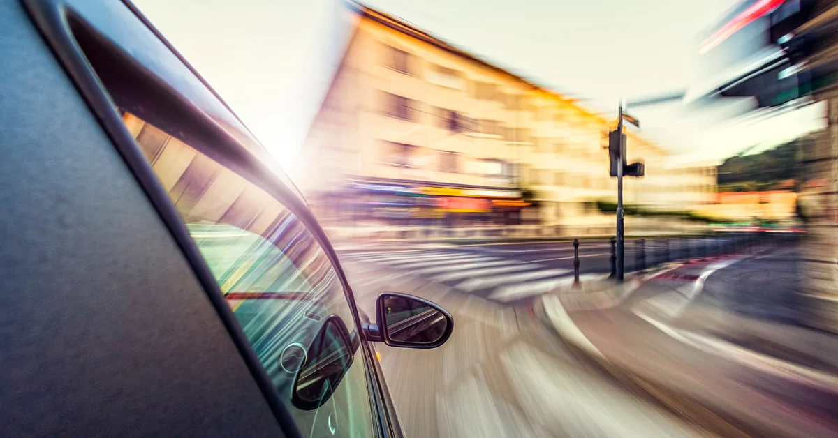 A car driving recklessly on a city street
